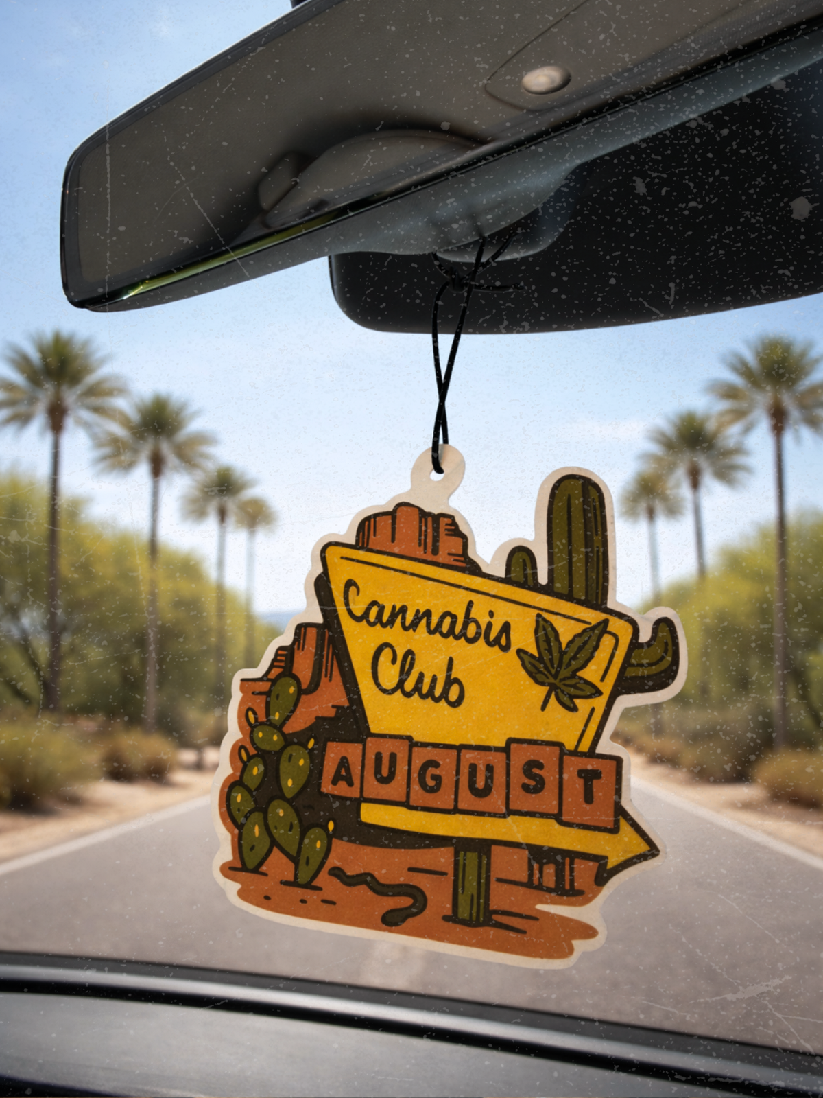 Desert motel themed car air freshener inside car | August Cannabis Club
