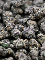 Close-up of Black Bow Indoor Exotic Smalls Indica THCa Smalls buds with a frosty texture | August Cannabis Club