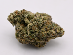 Giraffe Pussy Hybrid THCa flower with frosty green buds, orange pistils, and dense trichome coverage | August Cannabis Club