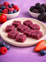 August Cannabis Club Hash Rosin Gummies Mixed Berries THCa gummies in assorted flavors displayed in branded product packaging | August Cannabis Club