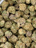 Purple Panty Dropper Exotic Smalls close-up showing crystal trichomes and bright orange hairs | August Cannabis Club
