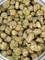 Purple Panty Dropper Exotic Smalls showing crystal trichomes and bright orange hairs | August Cannabis Club